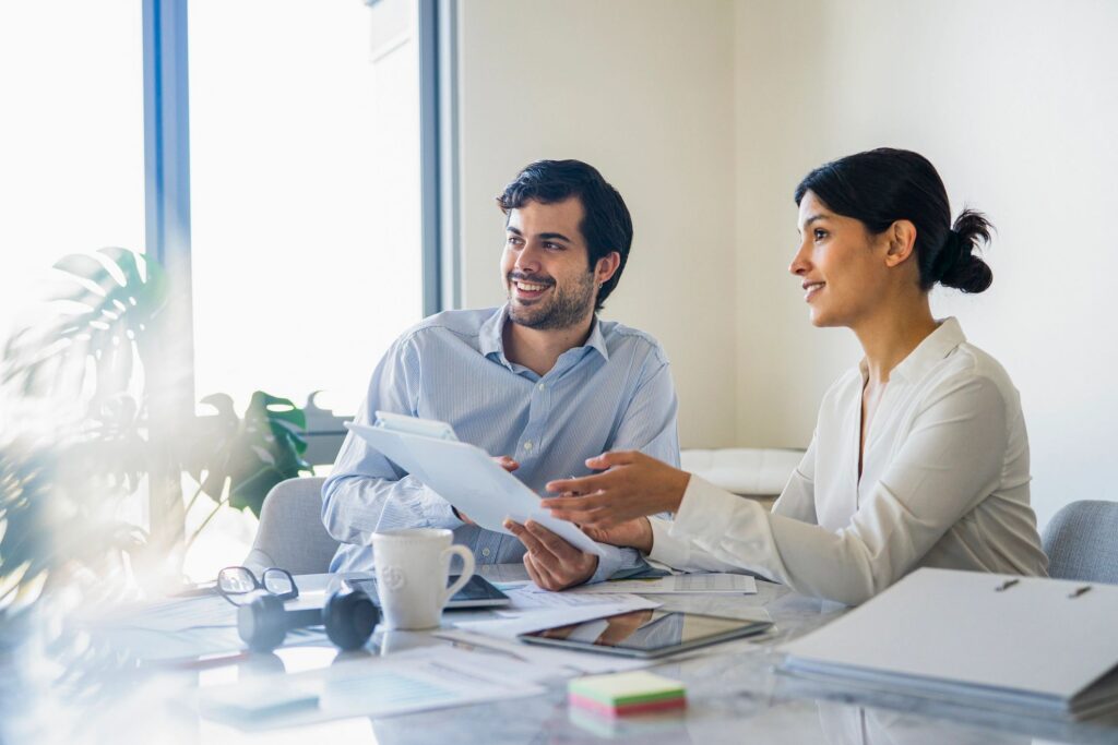 Business coworkers interacting during meeting at work