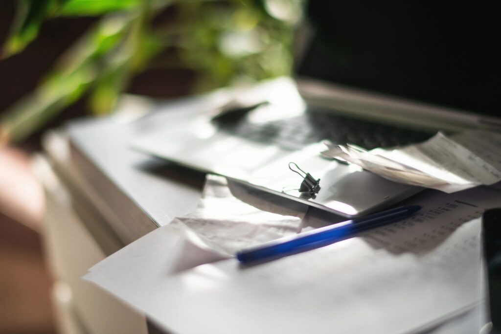 Laptop and documents on a table